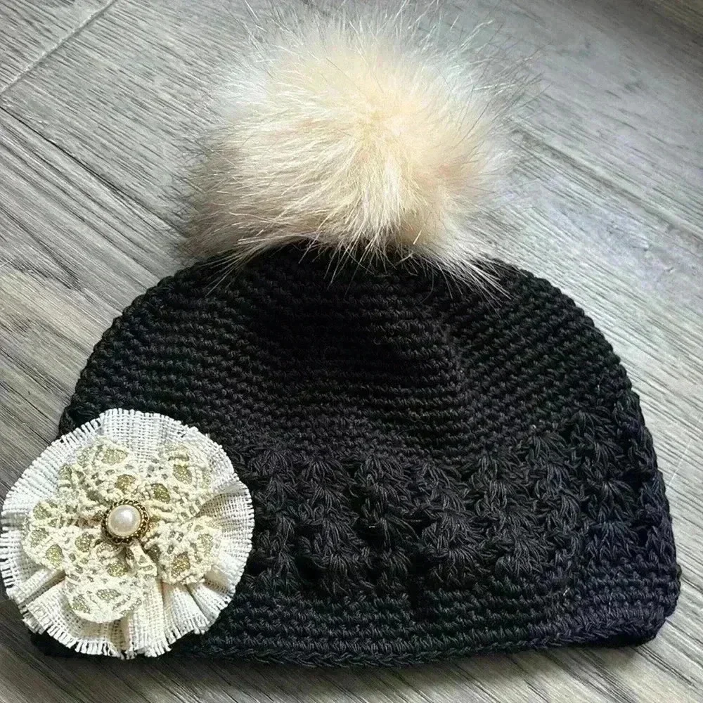 Hand crafted black crochet girls hat with flower and fuzzy pom pom - Picture 2 of 9